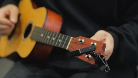 Ukulele guitar close up Stock Footage 103806993