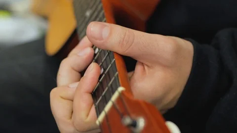 Ukulele guitar close up Stock Footage 103807055