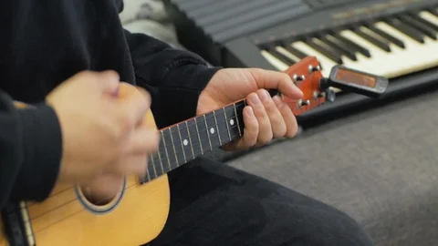 Ukulele guitar close up Stock Footage 103807089