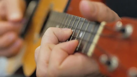 Ukulele guitar close up Stock Footage 103807330