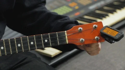 Ukulele guitar close up Stock Footage 103807727