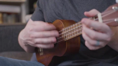 Ukulele Strumming 4K Stock Footage 243222594