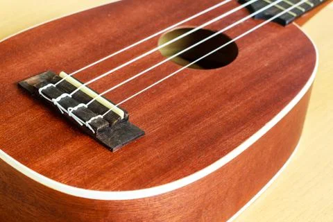 Ukulele on wood background Stock Photos