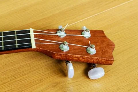 Ukulele on wood background Stock Photos