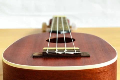 Ukulele on wood background Stock Photos