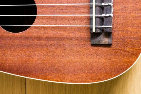 Ukulele on wood background Stock Photos