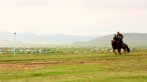 ULAANBAATAR, MONGOLIA - JULY 2013: Mongolian Cavalry at Naadam Festival Stock Footage 32425692