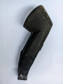 Ulekan and cobek classics, simple stones made of stone for smoothing out the spi Stock Photos