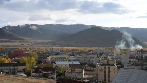 Uliastai, Mongolia: A High-Angle Pan of Soviet Buildings, Houses, and Rising Stock Footage 318721651