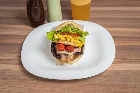Ultimate burger with egg and fresh ingredients Stock Photos