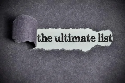 The ultimate list word under torn black sugar paper Stock Photos