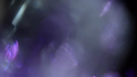Ultra-bright purple and white light rotating full screen Stock Footage 315540153