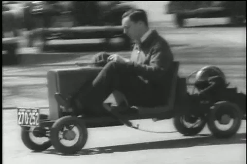 Ultra compact car with washing machine motor engine invention 1936 Stock Footage 85824330
