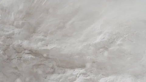 Ultra-detailed macro of disrupted white powder surface Stock Footage 337763473
