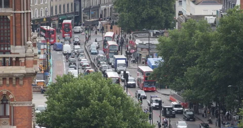 Ultra HD 4K Aerial View London Busy Street Road Commuter Commuting Rush Hour UK Stock Footage