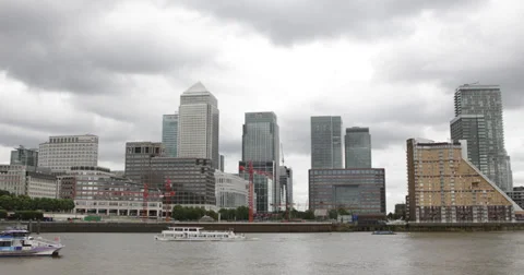 Ultra HD 4K London Canary Wharf Skyline Financial District British Boat Passing Stock Footage