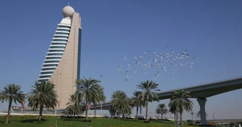 Ultra HD 4K Metro Train Passing Exotic Dubai Skyline Etisalat Tower Car Traffic Video stock 35658991