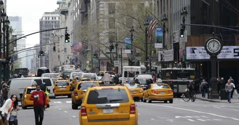 Ultra HD 4K NYC Yellow Cab Cars Busy Street Traffic Rush Hour New York City Day Stock Footage