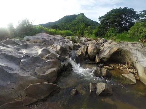 Ultra HD 4K rocky stream in nature water Stock Footage 77984072