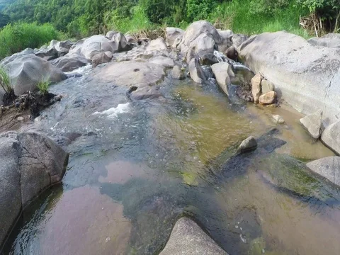 Ultra HD 4K rocky stream in nature water Stock Footage