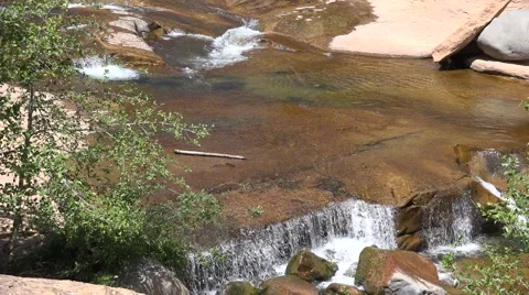 Ultra HD 4K Slide Rock Spring Stock Footage 45973053