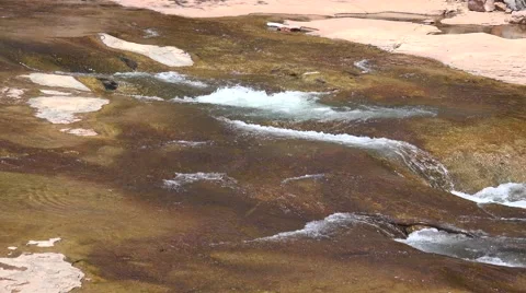 Ultra HD 4K Slide Rock Spring Stock Footage 45973953