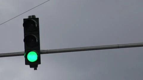 ULTRA HD 4K Traffic light hang blue sky change color green orange red day road  Video stock 41463591