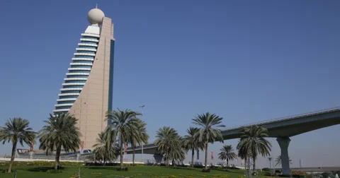 Ultra HD 4K Train Passing Busy Street Dubai Skyline Car Traffic Rush Hour Day Stock Footage 35659013