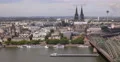 Ultra HD 4K UHD Cargo Ship Passing Rhine River City Cologne Skyline Aerial View 4k or 4k+ Resolution