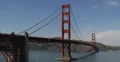 Ultra HD 4K UHD Famous Golden Gate Bridge, San Francisco Bay Boat Ship Pan Right 4k or 4k+ Resolution