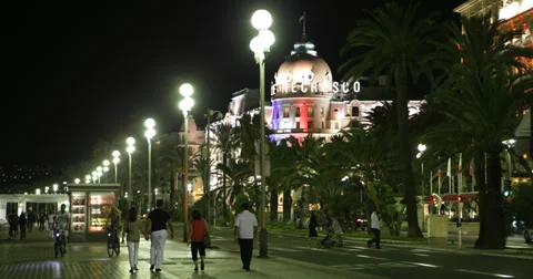 Ultra HD 4K UHD Night Lights Negresco Hotel Nice French Riviera People Walking Video stock 33193746