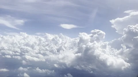 Ultra HD view of clouds from a plane's window Stock Footage 232341604