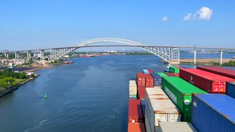 Ultra large container ship passing under the Bayonne Bridge Stock Footage 242828045