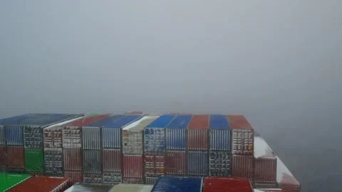 Ultra large container ship passing through the snow storm in Pacific ocean. Stock Footage 244385001