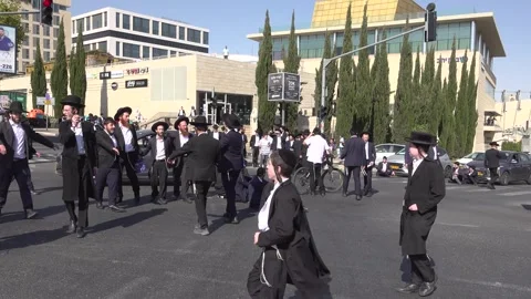 Ultra-Orthodox blocking traffic in Jerusalem Stock Footage 277584094