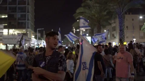Ultra right wing protest, people wave Messiah, Israeli flags, Tel Aviv, Israel Stock Footage 70726899