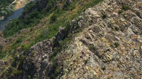 Ultra runner climbing down a mountain 6 drone Stock Footage 317238714