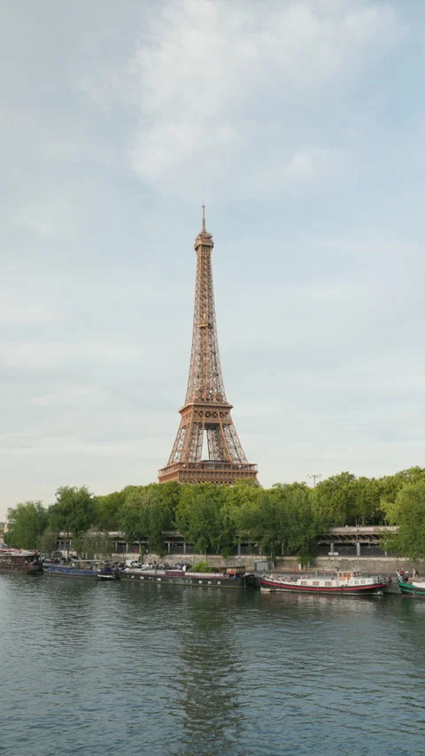 Ultra Sharp 4K Cinematic Portrait Shot of the Eiffel Tower Overlooking the Seine Stock Footage 338326893