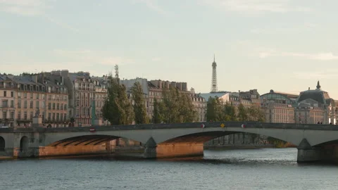 Ultra-sharp 4K wide landscape shot of a historic bridge spanning the Seine River Stock Footage 338173935