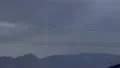 ultra slo mo multiple powerful mountain lightning at dusk HD-videomateriaal