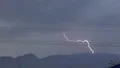 ultra slo mo powerful mountain lightning at dusk 1 HD Footage