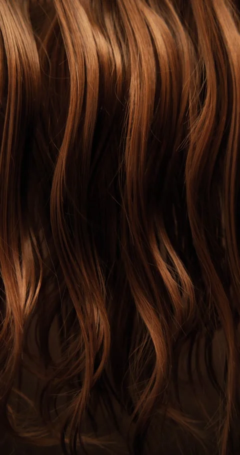 Ultra slow motion shot of dark brown hair flowing. Stock Footage 327859628