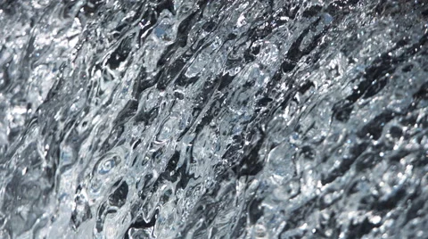 Ultra-slow motion silvery falling water Stock Footage 59527724