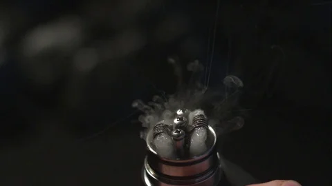 Ultra slow motion vape igniting Stock Footage 77688855