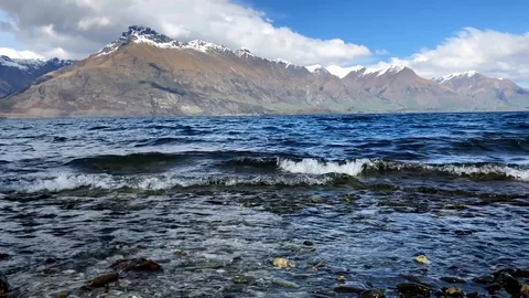Ultra Slow Motion of water waves in Queenstown New Zealand Stock Footage 95705652