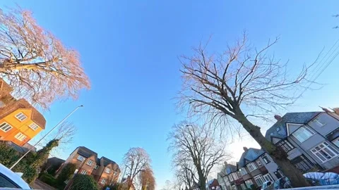 Ultra Wide Angle View of British City During Car Drive Stock Footage 326316024
