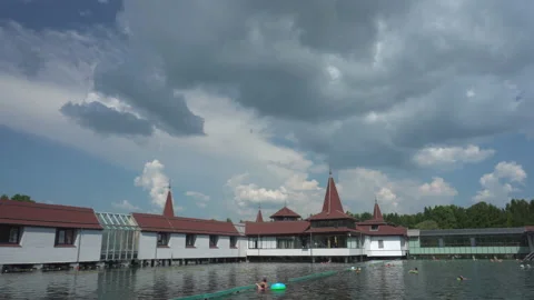 Ultra-wide panoramic view on spa complex buildings on thermal Heviz lake and Stock Footage 190999963