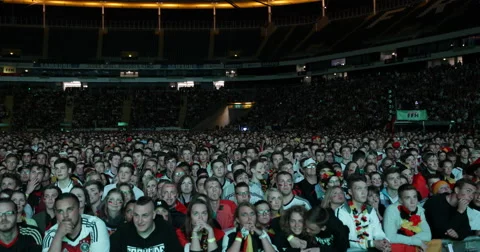 UltraHD 4K Pan Left View People Watching Football Match Germany Team Supporters Video stock 41497926