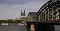 UltraHD 4K People Walk Hohenzollern Bridge Cologne Cathedral Skyline Sunny Day 4k or 4k+ Resolution