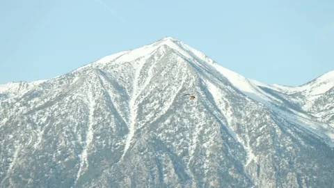 Ultralight flying over the Carson Valley with Hot Air Balloon Stock Footage 200813724